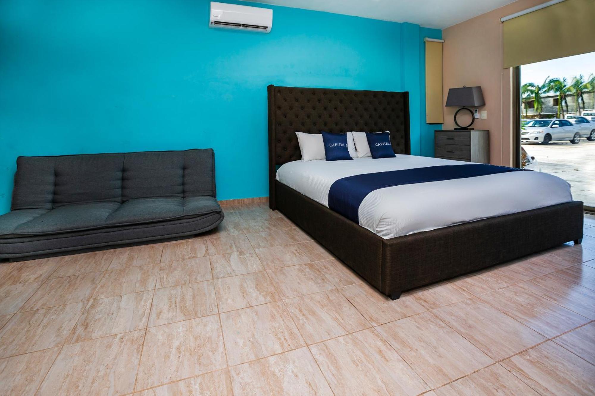 Capital O Cancun International Airport 24 7 Экстерьер фото