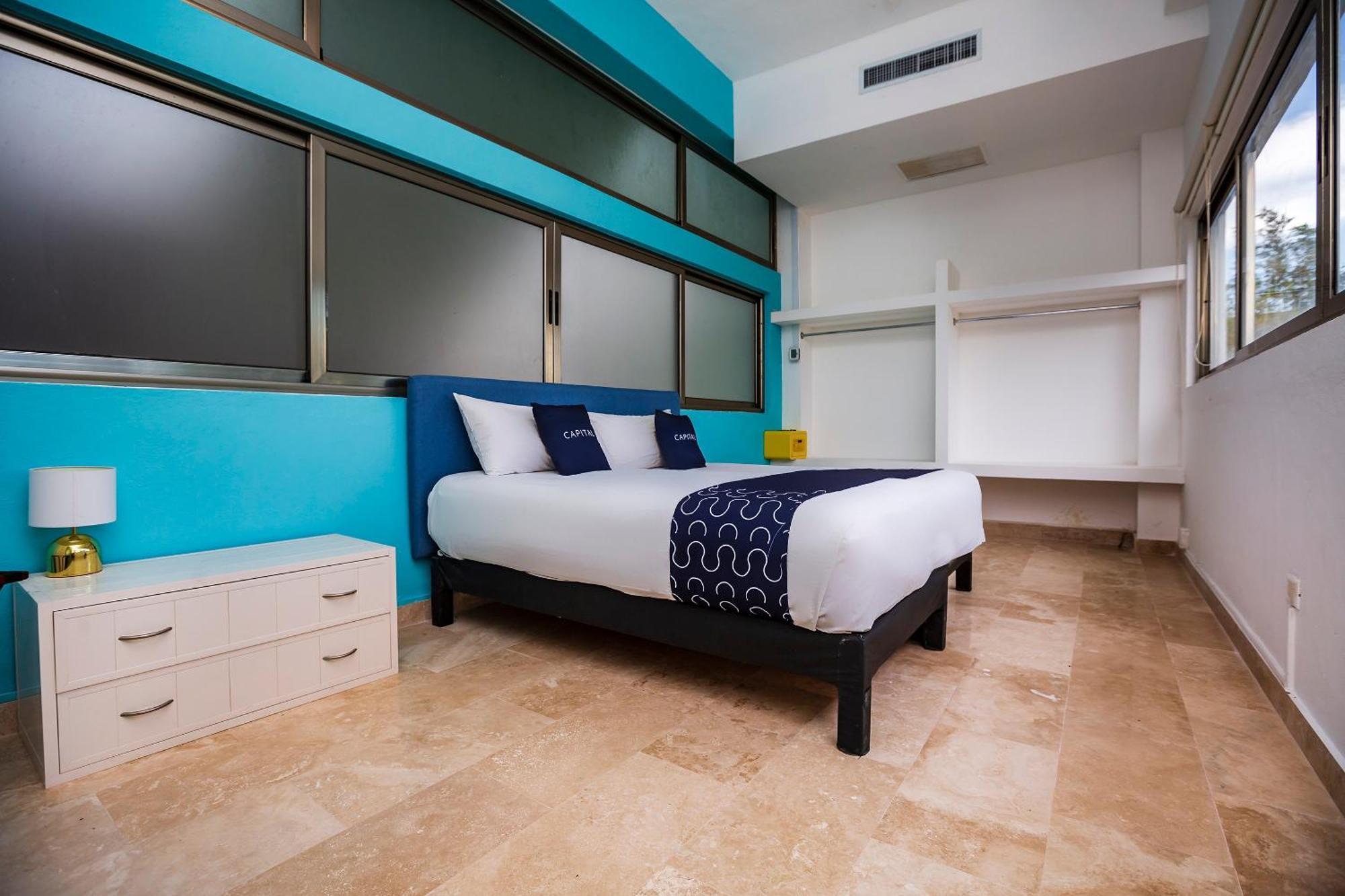 Capital O Cancun International Airport 24 7 Экстерьер фото